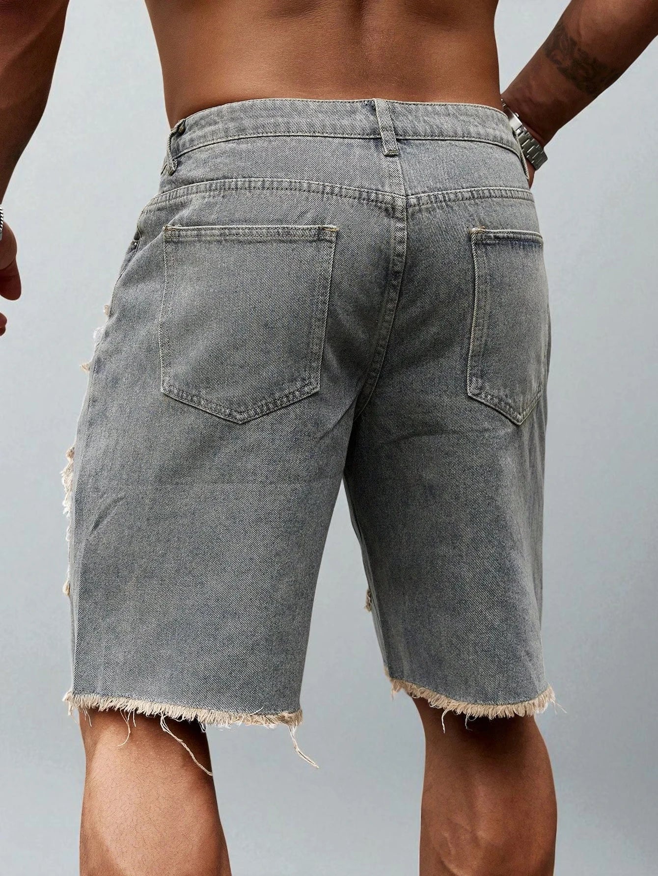 Short en jean déchiré homme