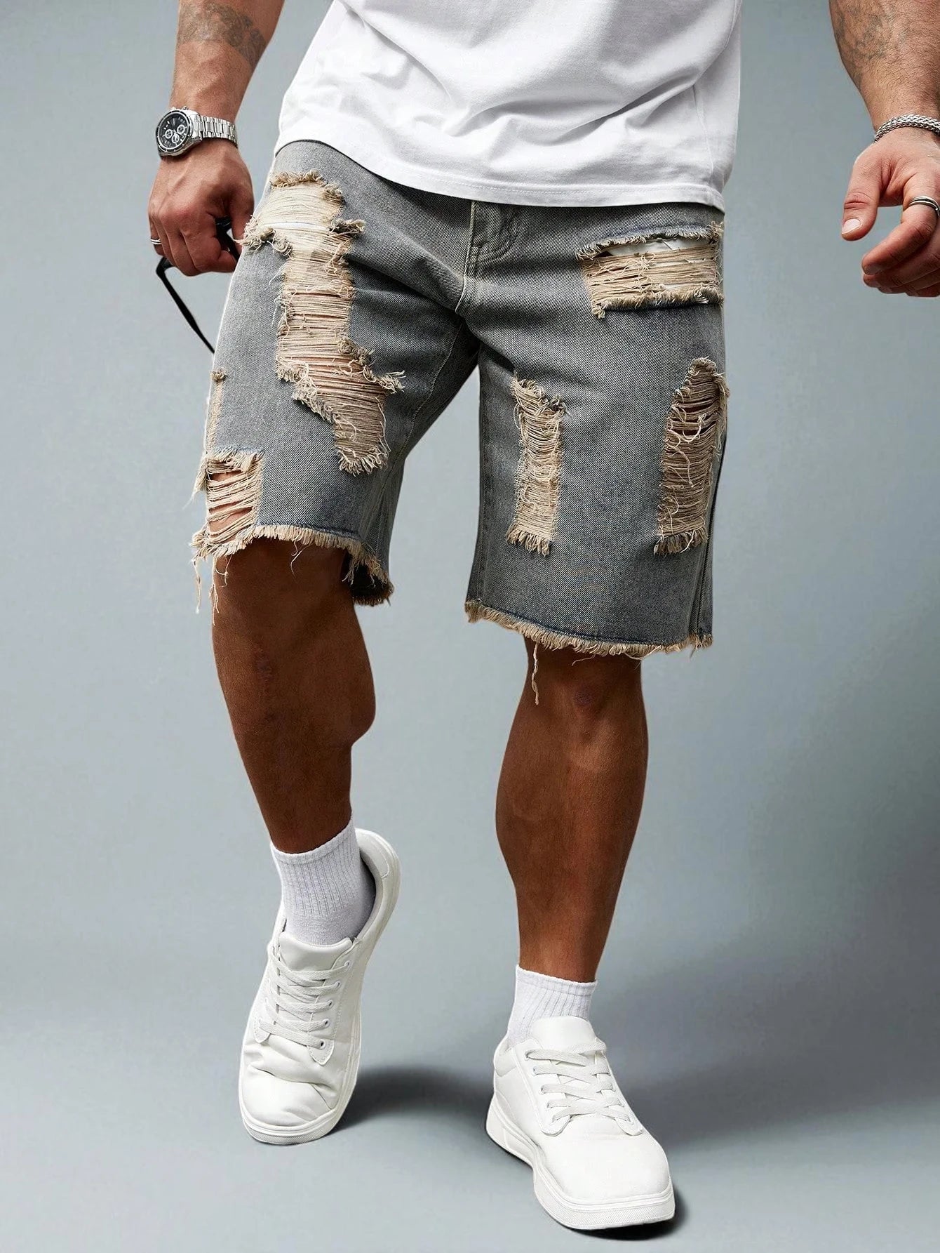 Short en jean déchiré homme